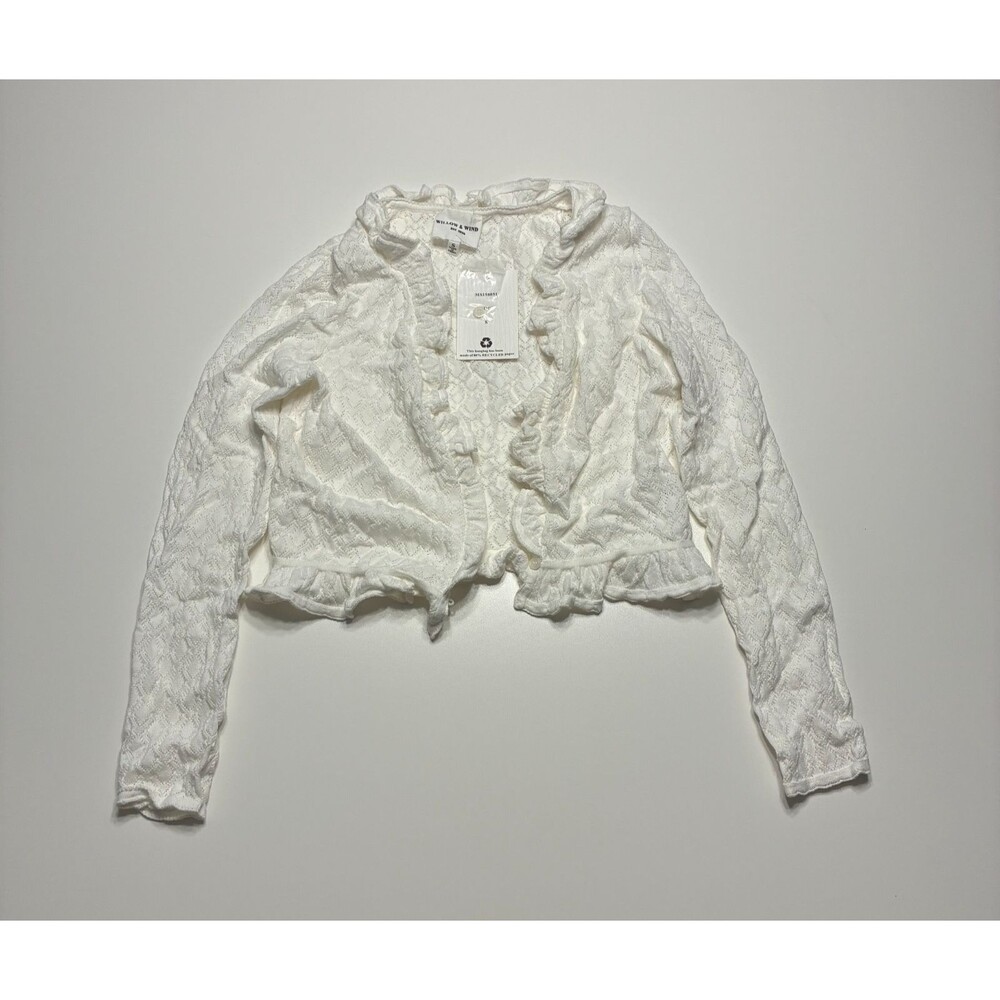 Wind and Willow NWT size small. Cable knit design with delicate tie front.